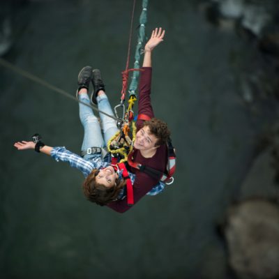 Couple smiling after tandem swing
