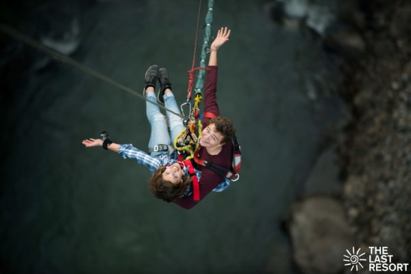 Couple smiling after tandem swing
